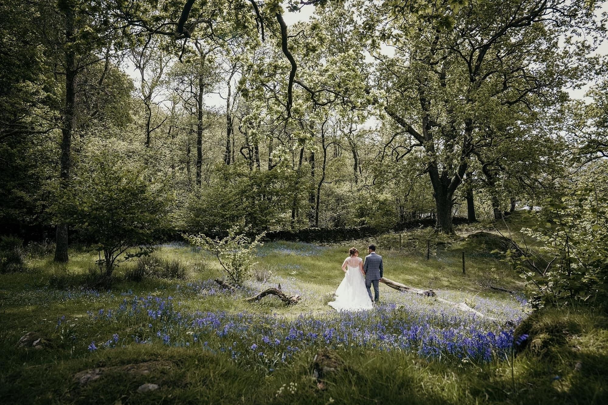 Couple enjoying the woodland at Cote How a perfect rural wedding venue