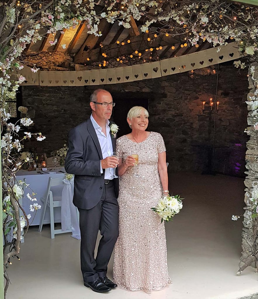 Cheers - Happy Couple after their intimate wedding in the Lakes