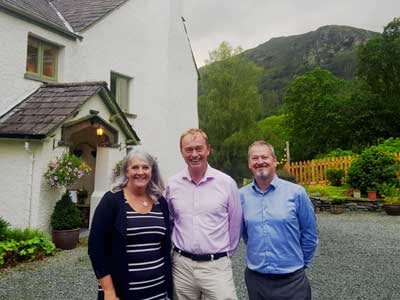 Tim Farron MP at Cote How with owners Caroline and Steve