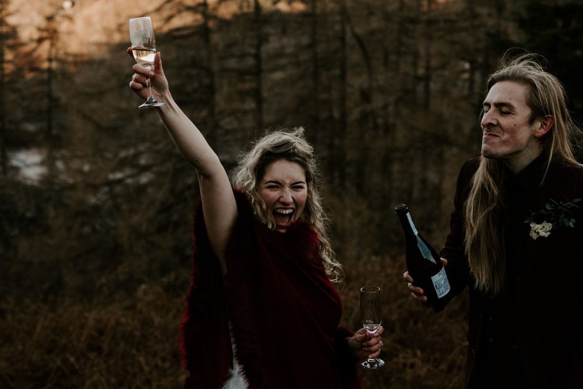 Elopement-Wedding-Couple-Celebrating-with-Prosecco