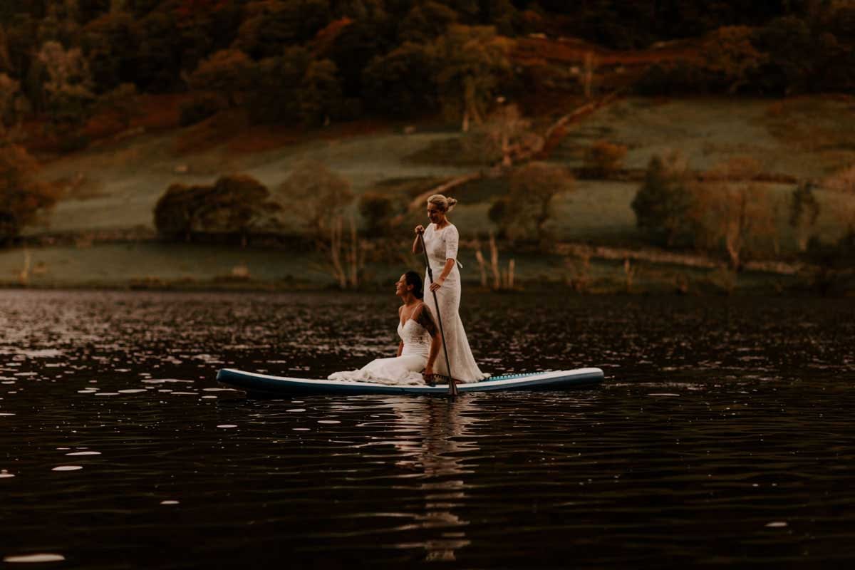 Two Brides on paddle board on rydal water