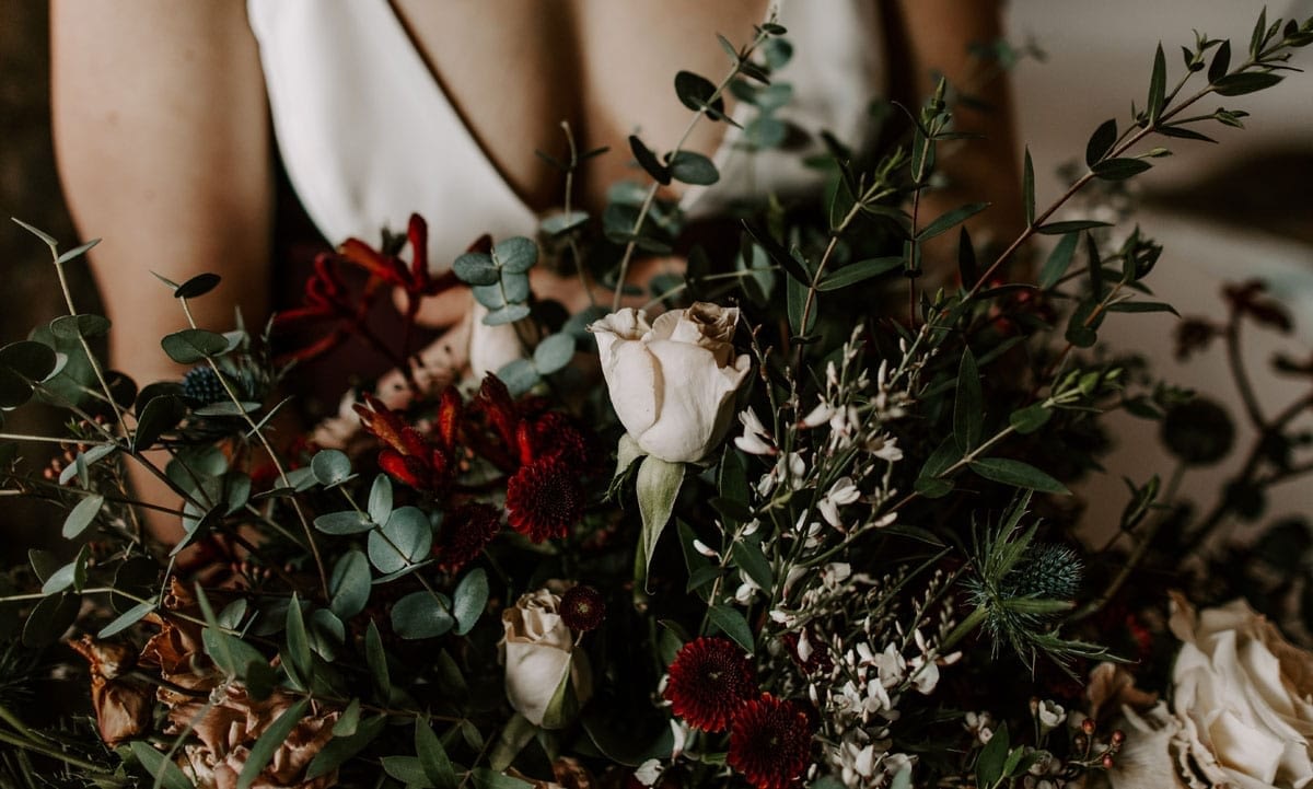 Winter Bridal Bouquet in Burgundy and Eucalyptus Green