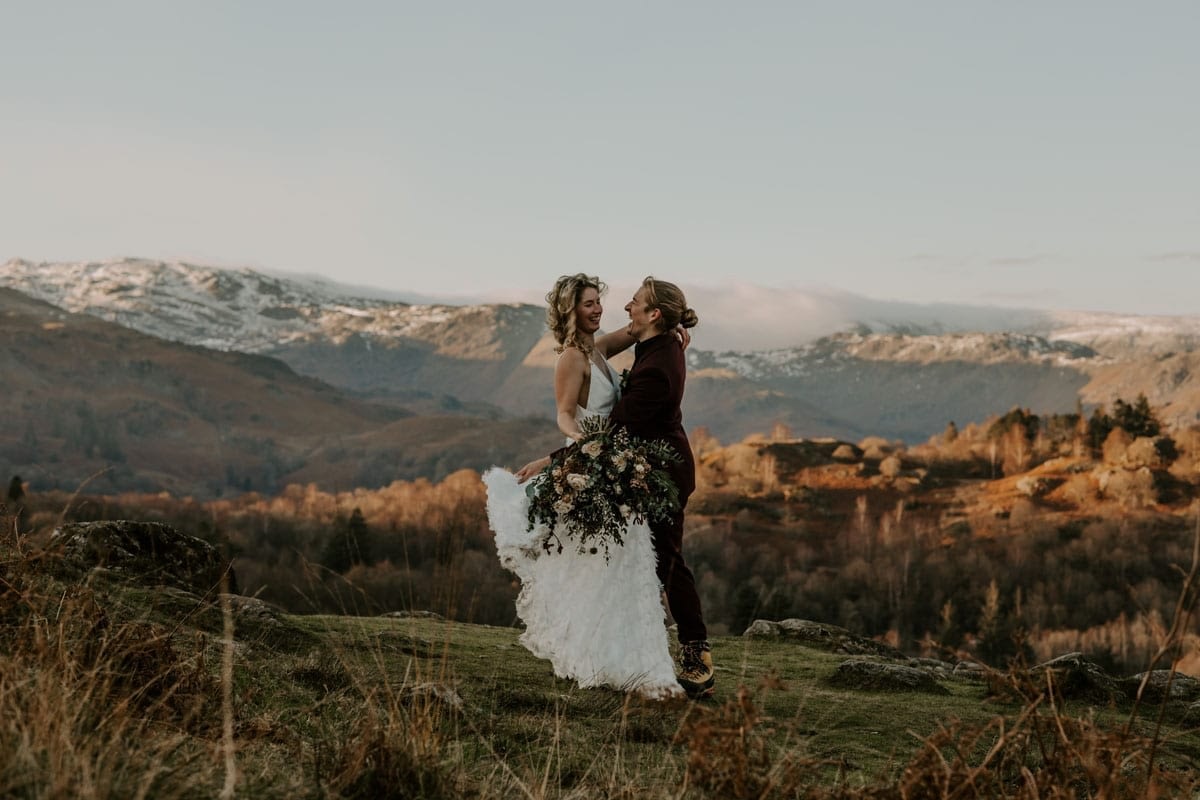 Wedding Couple celebrating their mountain wedding in the Lakes