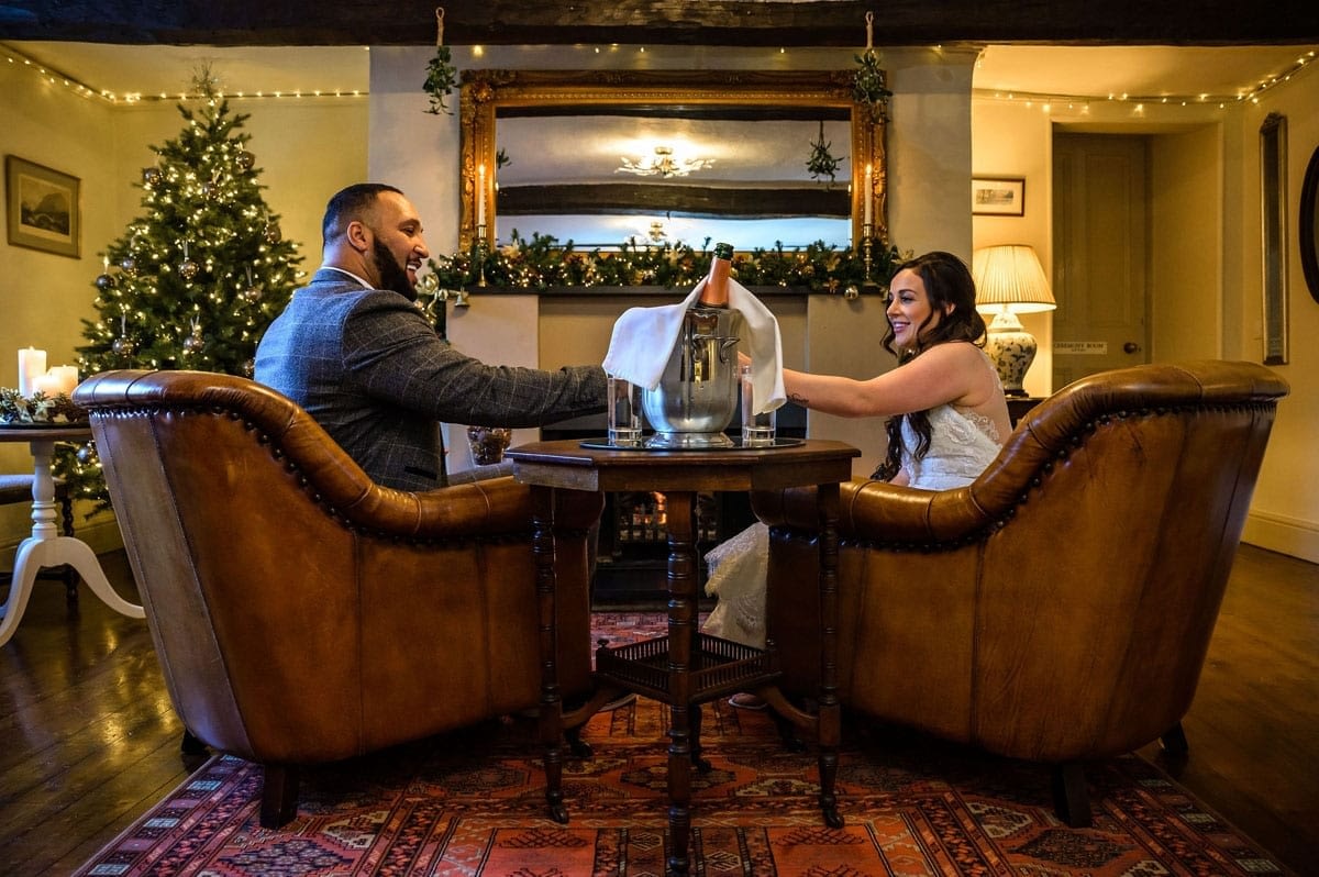 Elopement-couple-drinking-enlglish-sparkling-wine