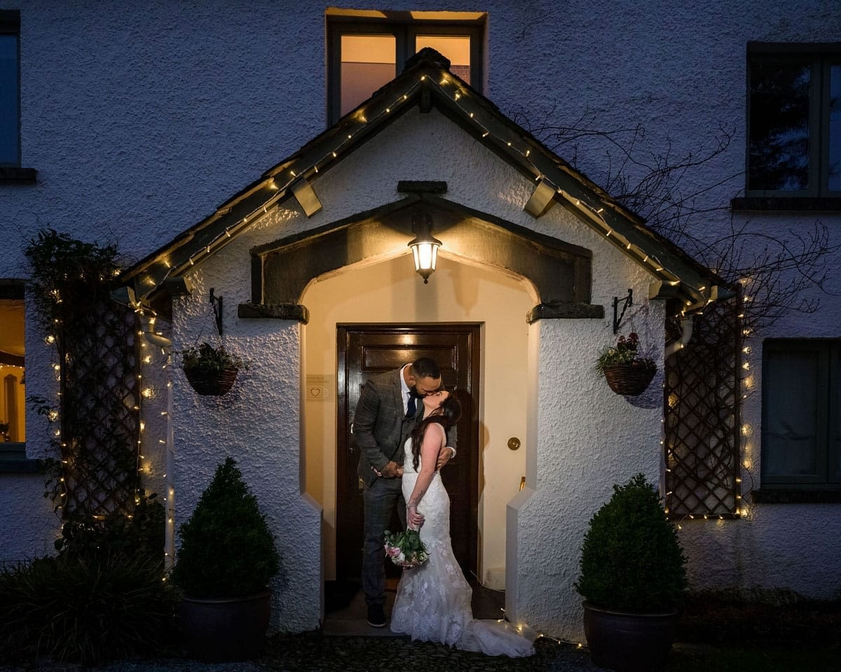 Elopement-couple-stood-in-Cote-How-porch