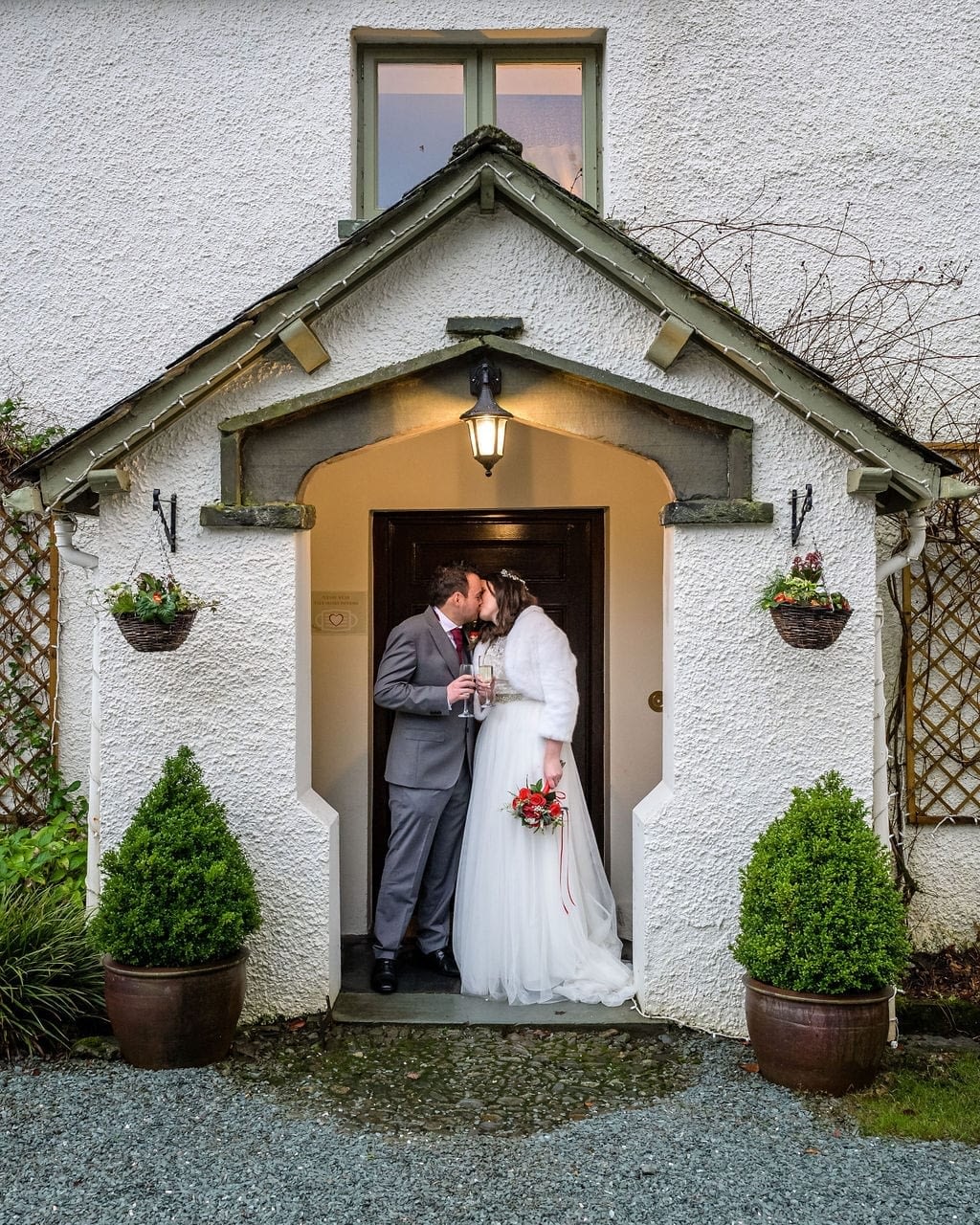 Wedding-couple-stood-in-Cote-How-porch