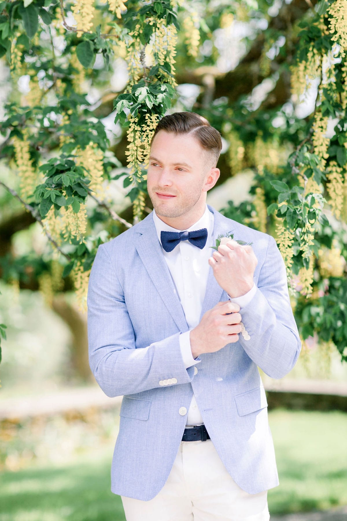 Groom waits patiently for small wedding ot begin