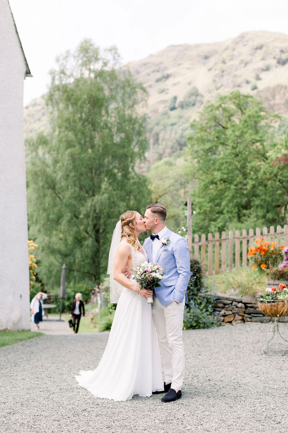 Wedding couple outside intimate wedding venue