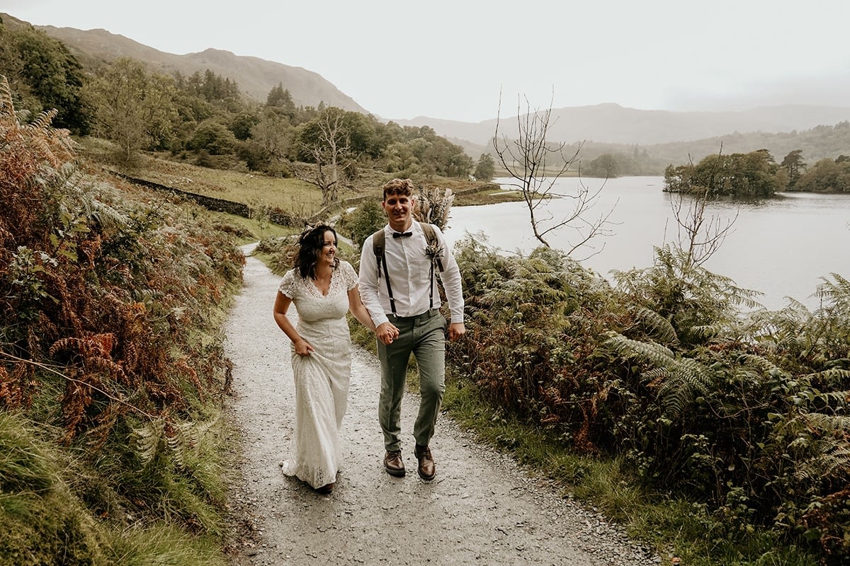 Elopement couple walking hand in hand