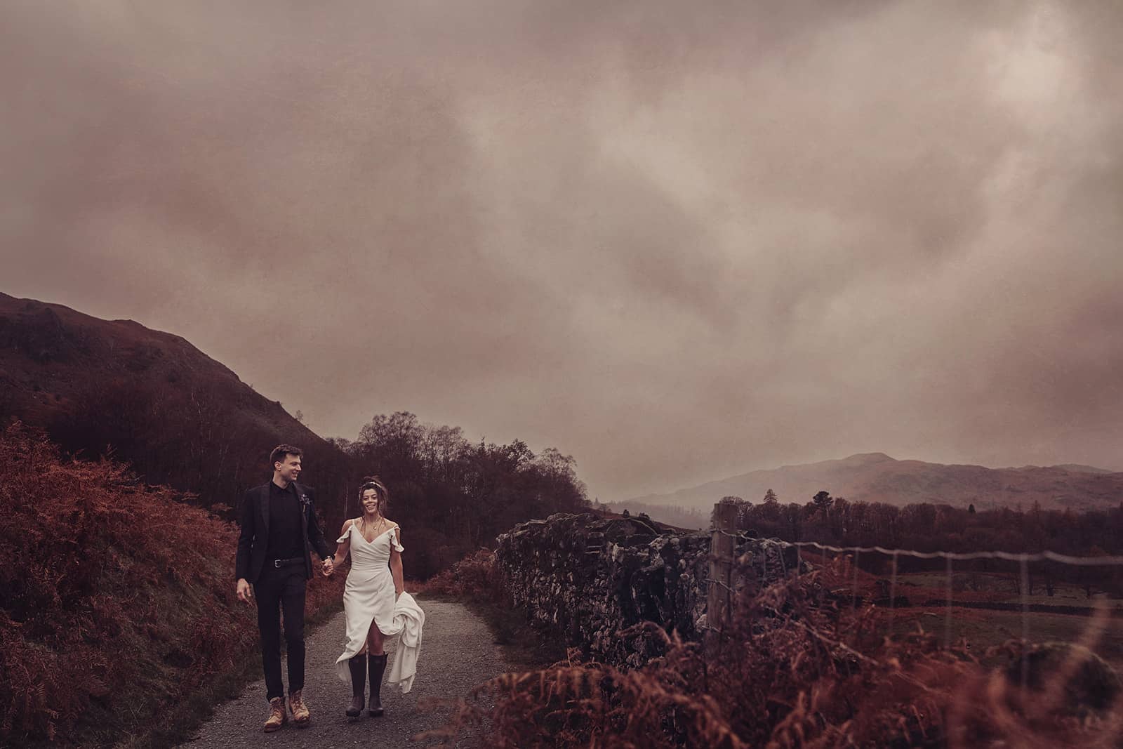 Elopement couple walking down path