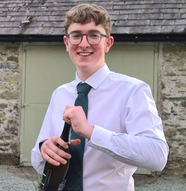 Dan-opening-the-Prosecco---Wedding-Venue-Team
